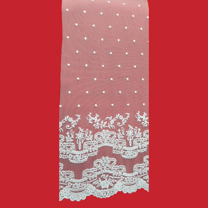 Tela de tul bordado beige doble punta con flores y topitos (140cm)
