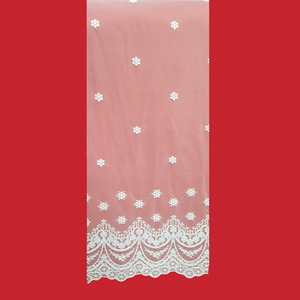 Tela de tul bordado blanco doble punta con estrellas (140cm)