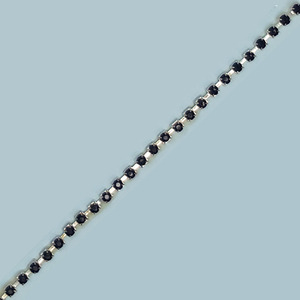 Pasamanería de pedrería plata brillante y negro (0,5 cm)